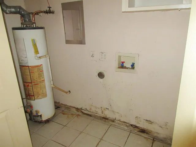 a bathroom with a sink and mirror