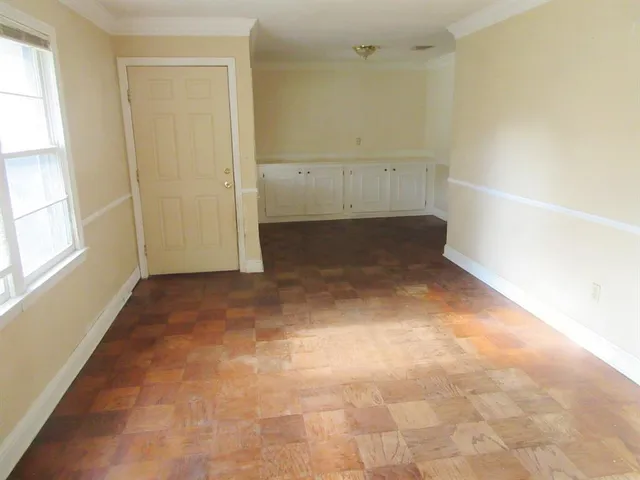 an empty room with a natural light