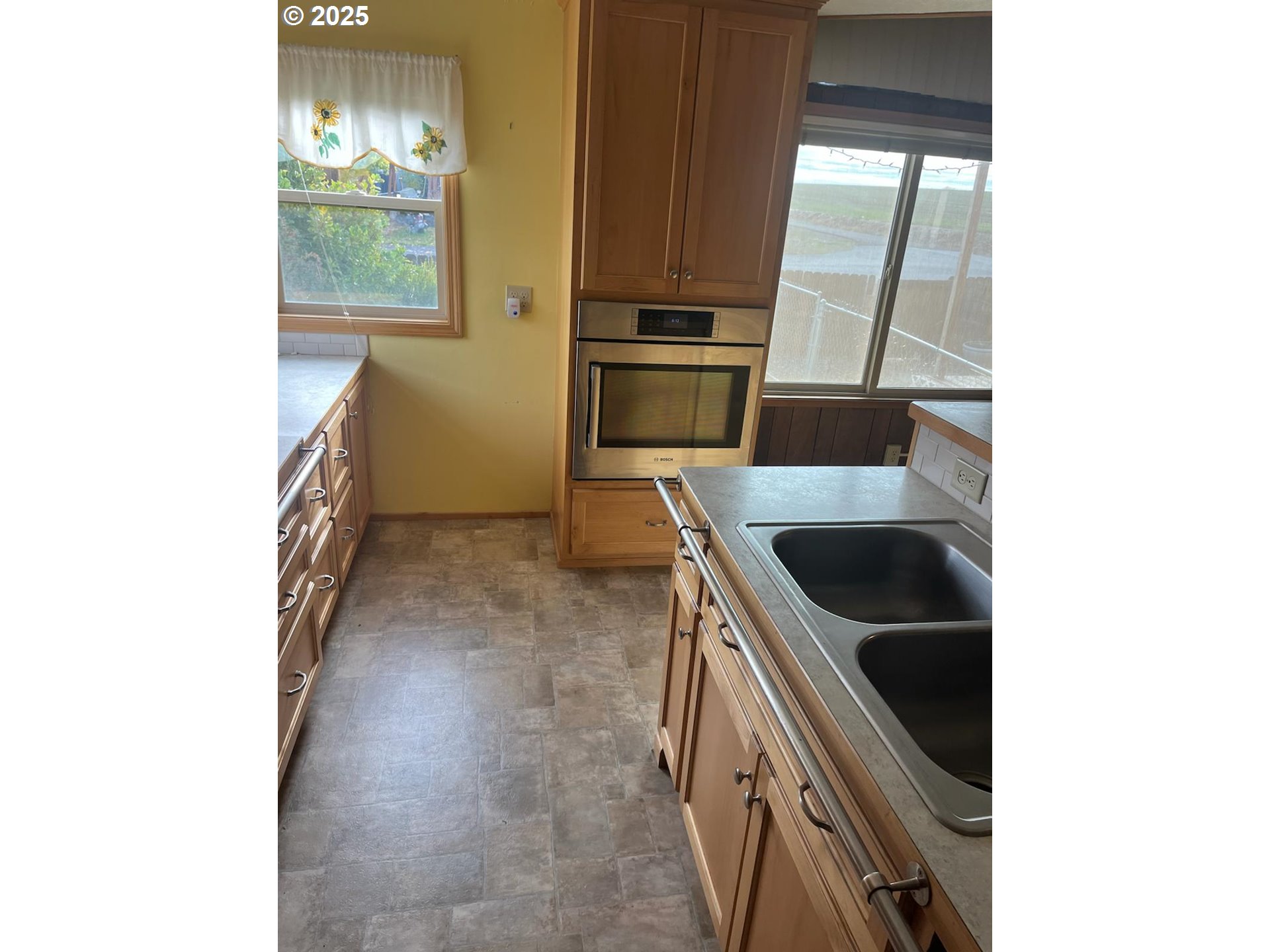 355 West Washington Street Athena, OR 97813 - Photo 11 of 32 a kitchen with a sink and a stove