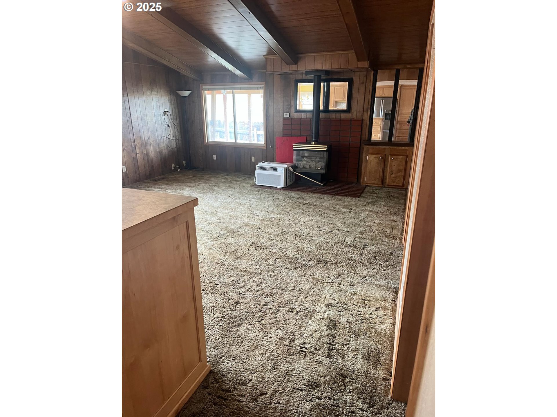 355 West Washington Street Athena, OR 97813 - Photo 16 of 32 a hallway with furniture and a window