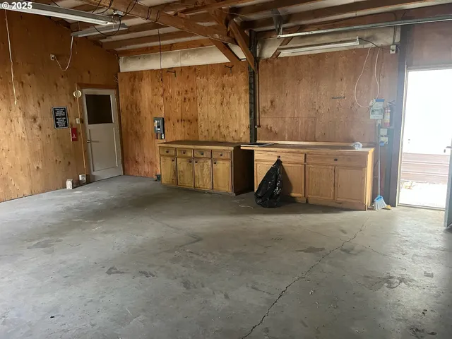 a view of a hallway with a window