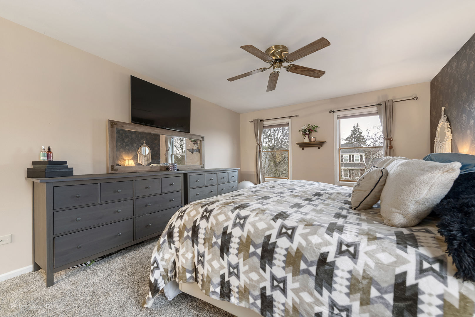 2001 Madison Avenue Gurnee, IL 60031 - Photo 13 of 26 a bedroom with a bed and a flat screen tv