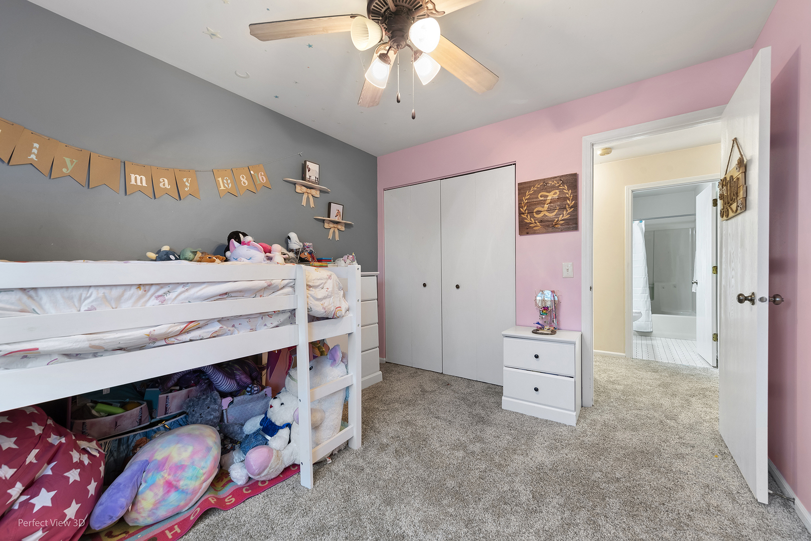 2001 Madison Avenue Gurnee, IL 60031 - Photo 16 of 26 a bedroom with a bed and a chandelier