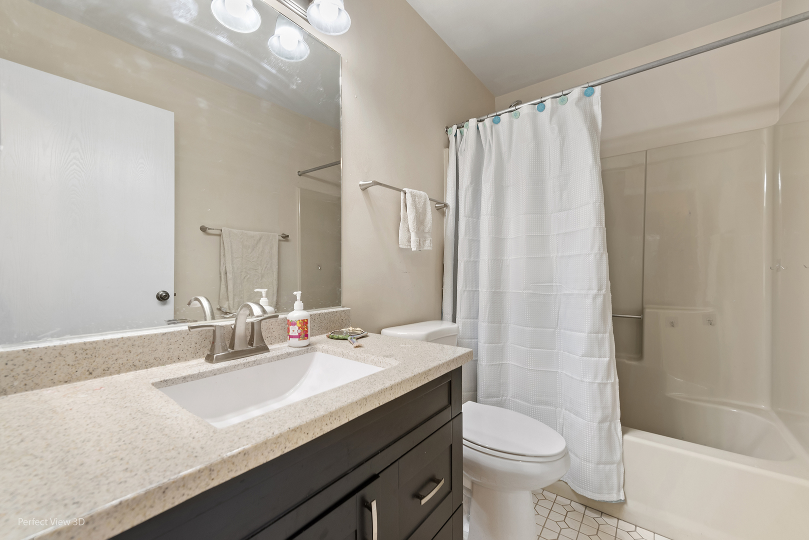 2001 Madison Avenue Gurnee, IL 60031 - Photo 17 of 26 a bathroom with a sink a toilet and shower