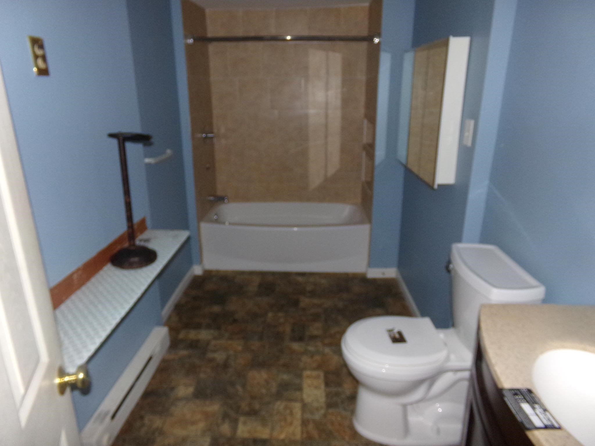 14 Gibson Avenue Whitesboro, NJ 08210 - Photo 12 of 25 a bathroom with a tub and toilet
