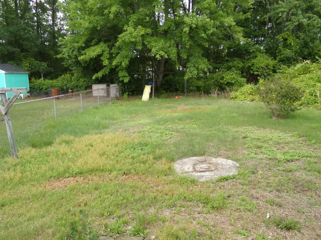 an empty room with a empty space and a window