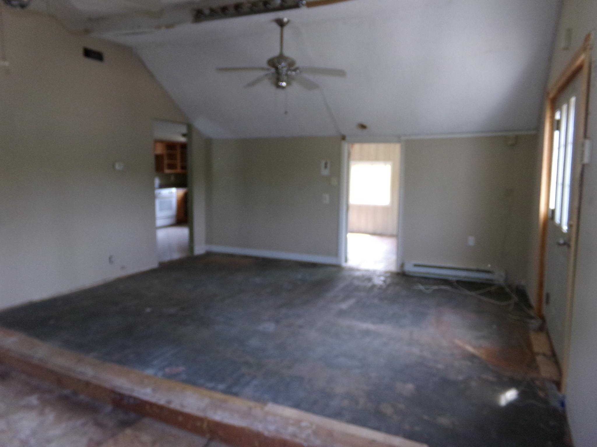 14 Gibson Avenue Whitesboro, NJ 08210 - Photo 5 of 25 an empty room with a empty space and a window