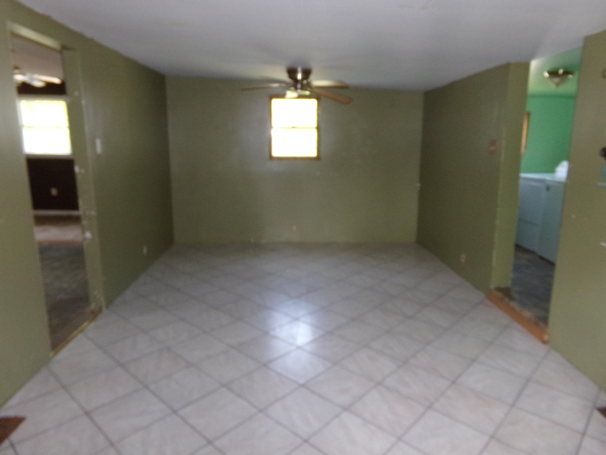 14 Gibson Avenue Whitesboro, NJ 08210 - Photo 10 of 25 en empty room with windows