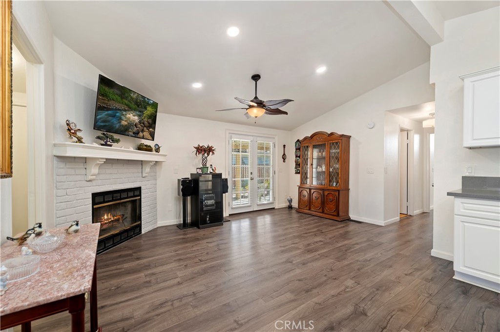 27250 Murrieta Road, Unit 120 Menifee, CA 92586 - Photo 12 of 46 a living room with furniture fireplace and flat screen tv