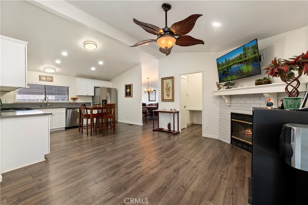 27250 Murrieta Road, Unit 120 Menifee, CA 92586 - Photo 14 of 46 a living room with furniture and a flat screen tv