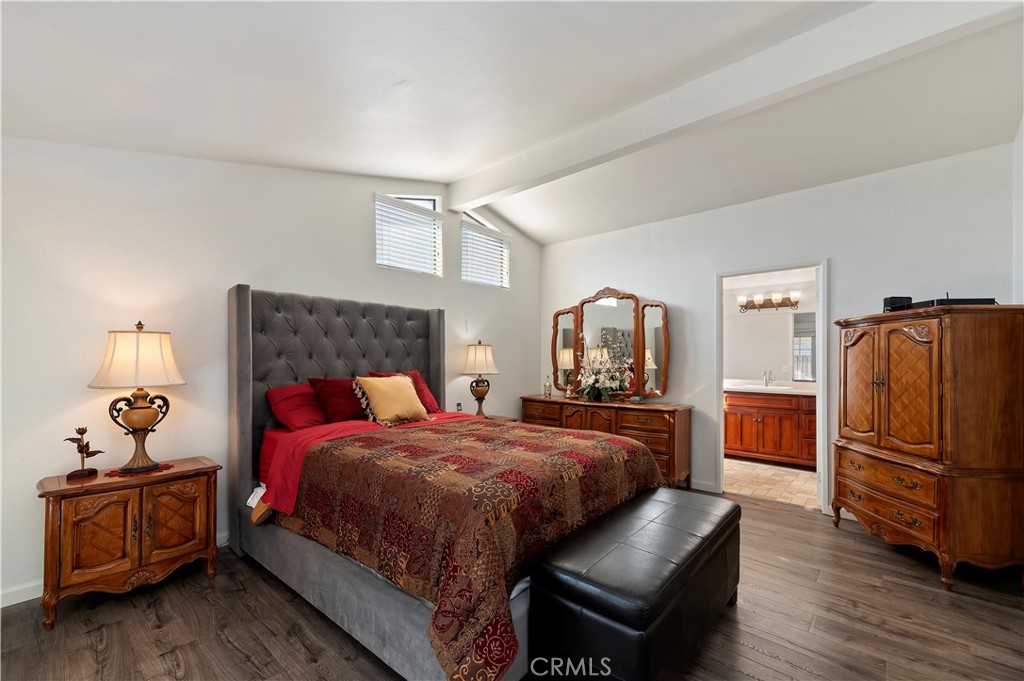 27250 Murrieta Road, Unit 120 Menifee, CA 92586 - Photo 20 of 46 a bedroom with a bed and wooden floor