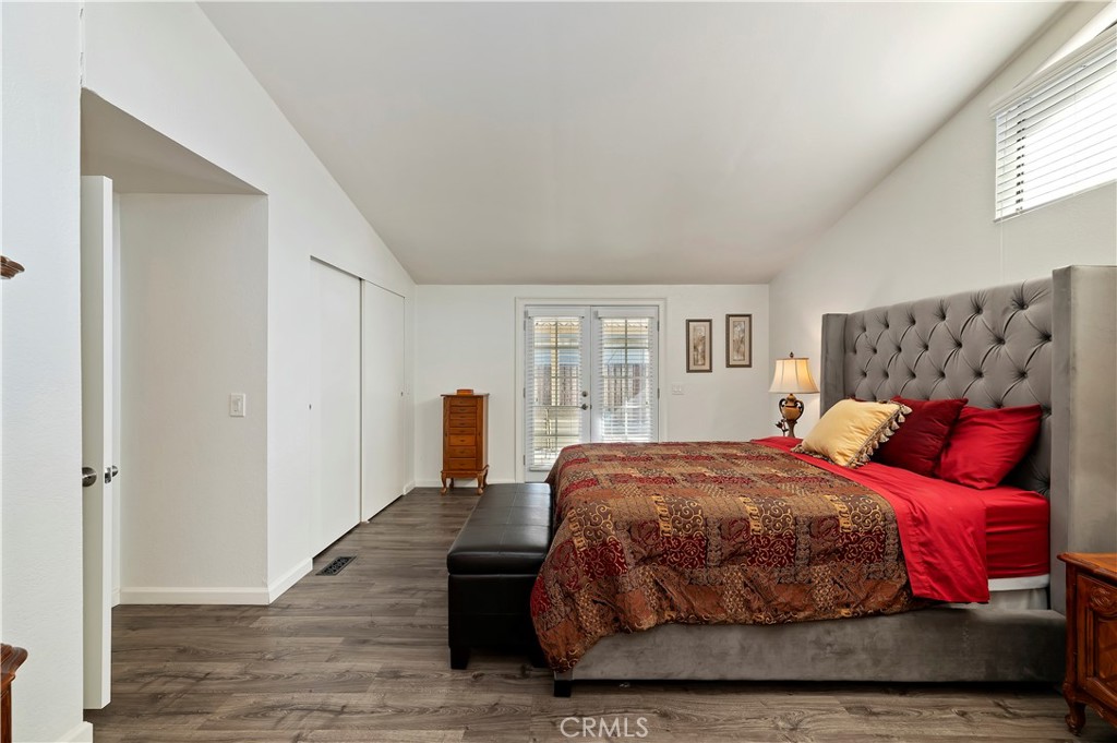 27250 Murrieta Road, Unit 120 Menifee, CA 92586 - Photo 21 of 46 a bedroom with a large bed and a window