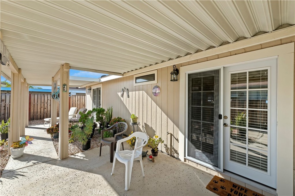27250 Murrieta Road, Unit 120 Menifee, CA 92586 - Photo 30 of 46 a view of a porch with furniture