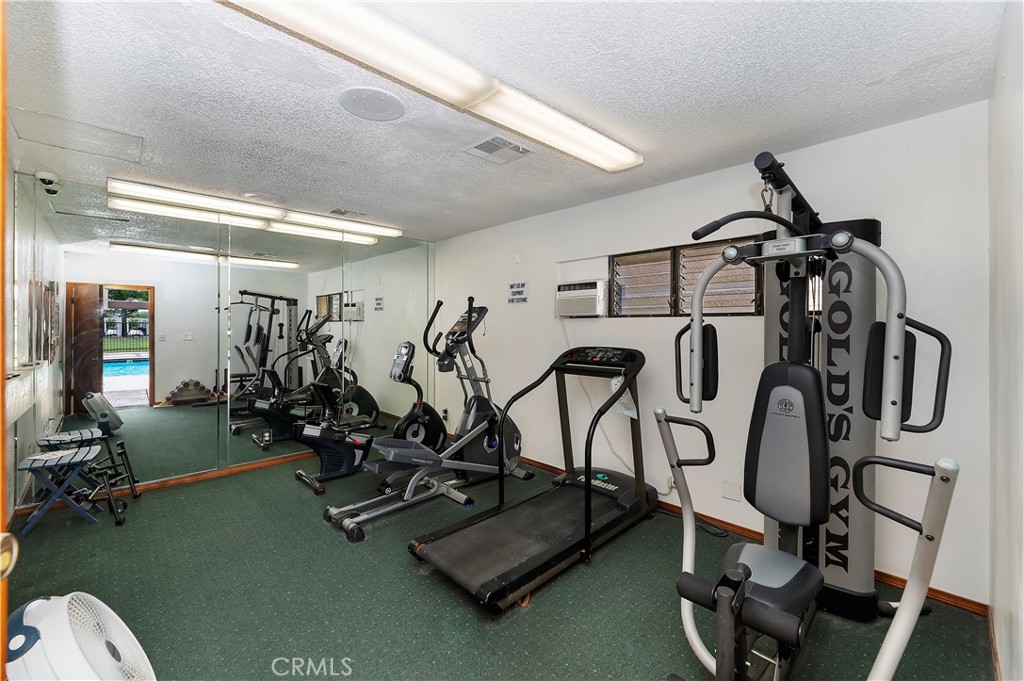 27250 Murrieta Road, Unit 120 Menifee, CA 92586 - Photo 35 of 46 a view of a room with gym equipment