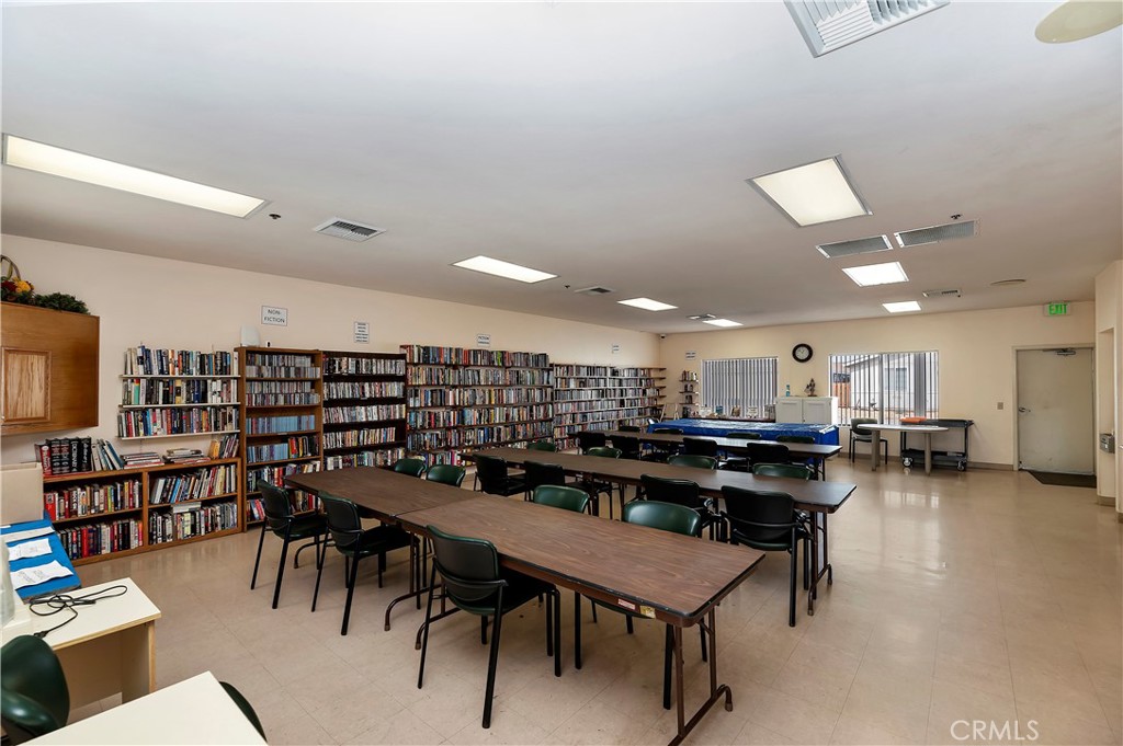 27250 Murrieta Road, Unit 120 Menifee, CA 92586 - Photo 36 of 46 a kitchen with a table and chairs in it