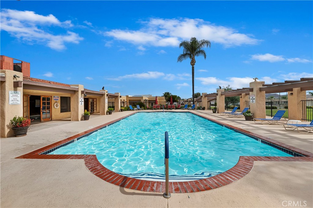 27250 Murrieta Road, Unit 120 Menifee, CA 92586 - Photo 41 of 46 a view of a swimming pool with a patio