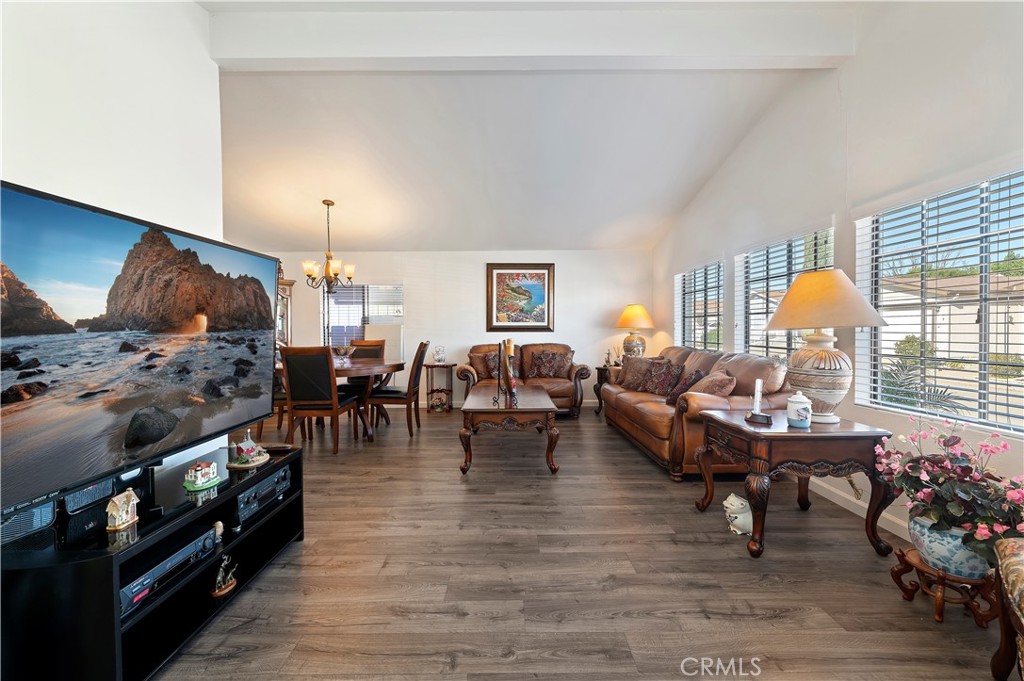 27250 Murrieta Road, Unit 120 Menifee, CA 92586 - Photo 6 of 46 a living room with furniture and wooden floor