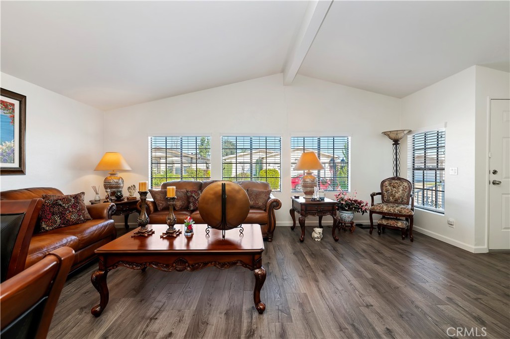 27250 Murrieta Road, Unit 120 Menifee, CA 92586 - Photo 8 of 46 a living room with furniture and wooden floor