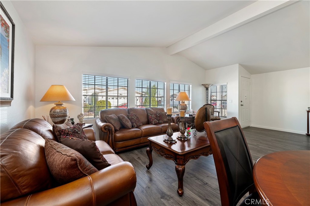 27250 Murrieta Road, Unit 120 Menifee, CA 92586 - Photo 9 of 46 a living room with furniture a rug and a window