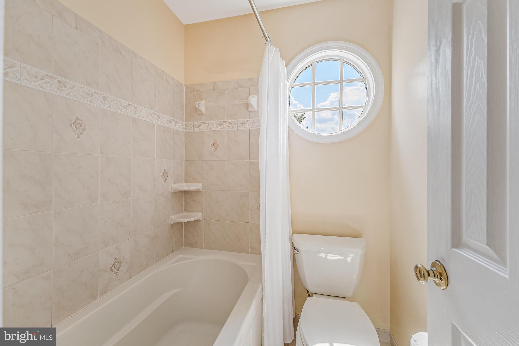 5501 Ashleigh Road Fairfax, VA 22030 - Photo 52 of 77 a bathroom with a toilet and a sink