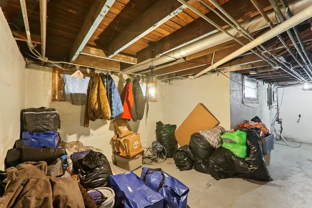 a room with lots of different colored cloths