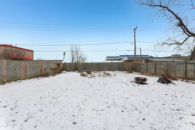 a view of a backyard of snow