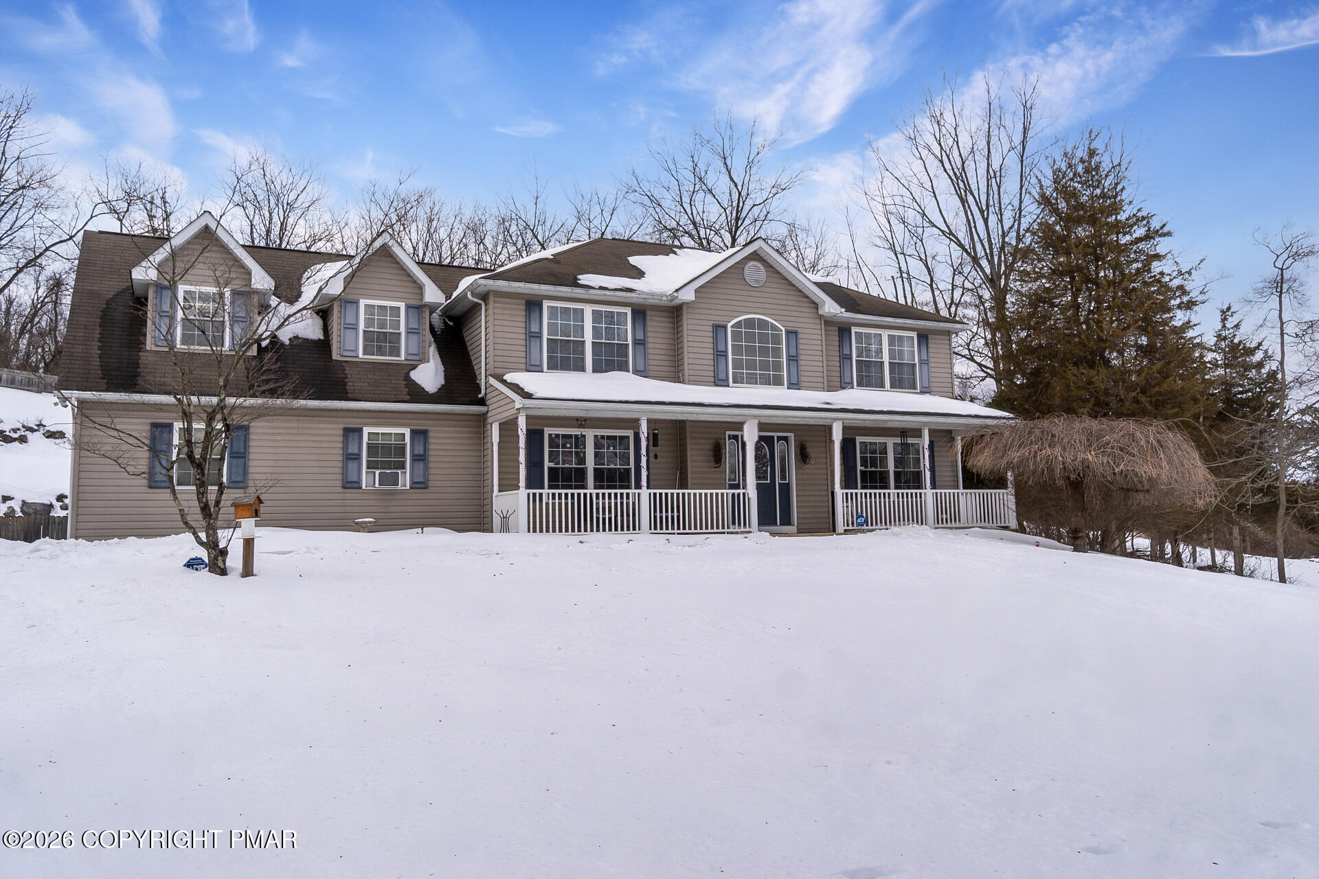 95 Benns Hill Road Bangor, PA 18013 - Photo 2 of 70 a front view of a house with a yard covered with snow in front of house