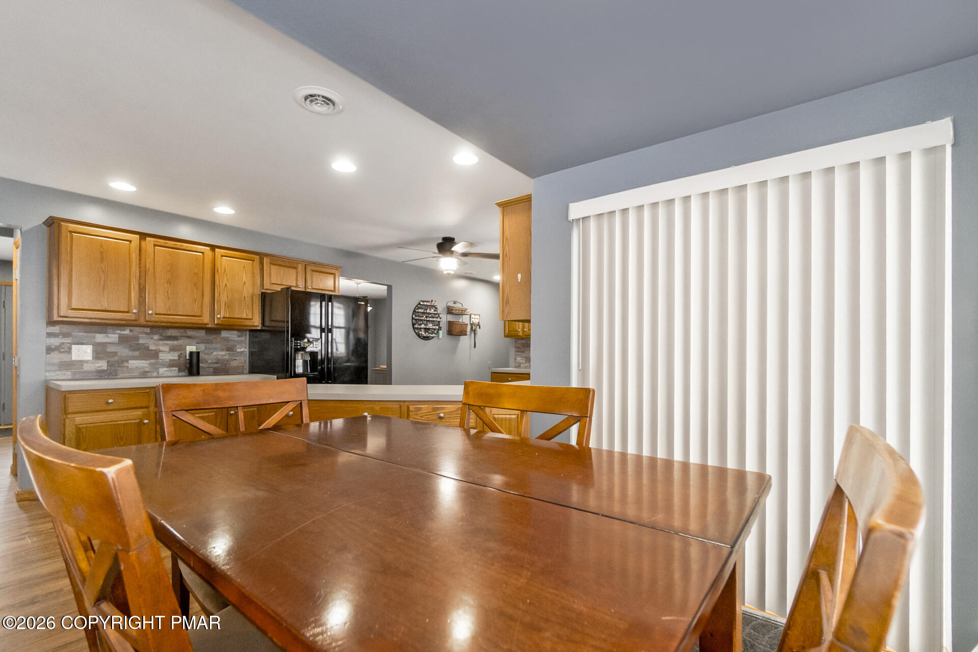 95 Benns Hill Road Bangor, PA 18013 - Photo 24 of 70 a view of a swimming pool and a dining room with furniture