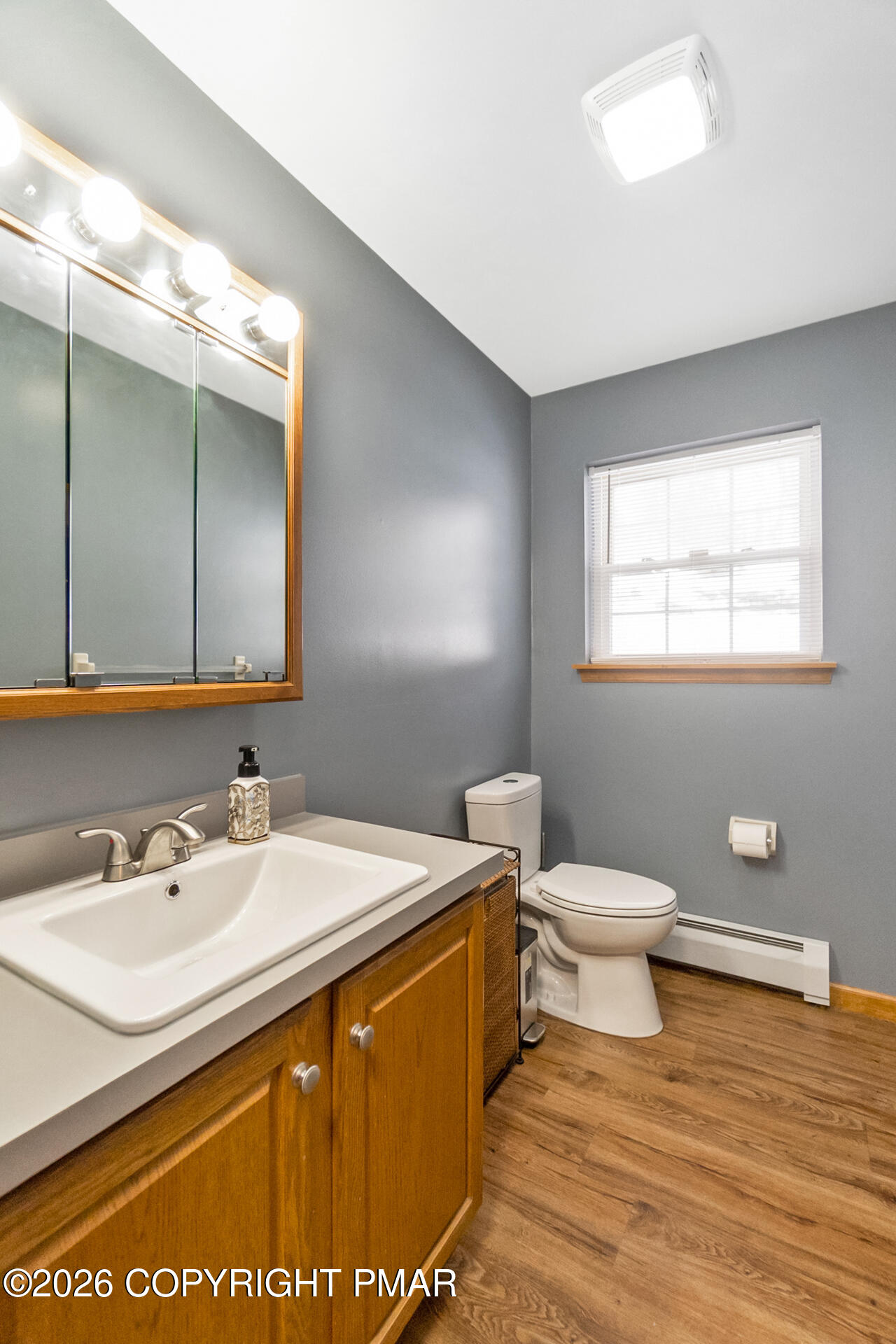 95 Benns Hill Road Bangor, PA 18013 - Photo 37 of 70 a bathroom with a sink a toilet and mirror