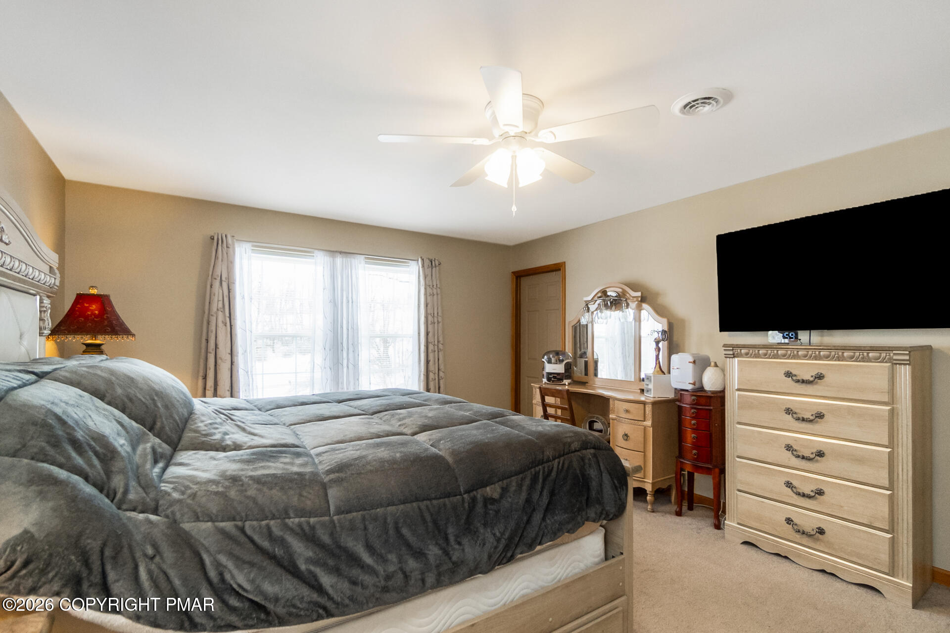 95 Benns Hill Road Bangor, PA 18013 - Photo 40 of 70 a bedroom with a bed and a flat tv screen on dresser