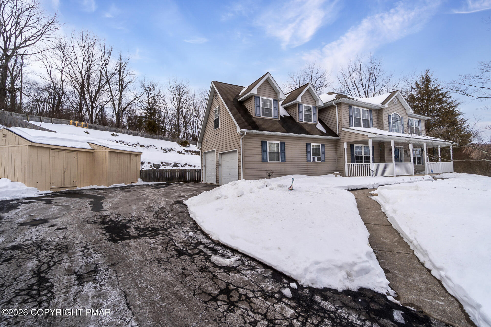 95 Benns Hill Road Bangor, PA 18013 - Photo 4 of 70 a view of a white house with a large window and a yard