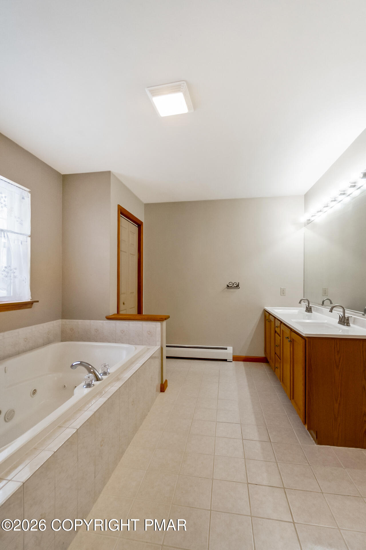 95 Benns Hill Road Bangor, PA 18013 - Photo 48 of 70 a bathroom with a bathtub and a sink