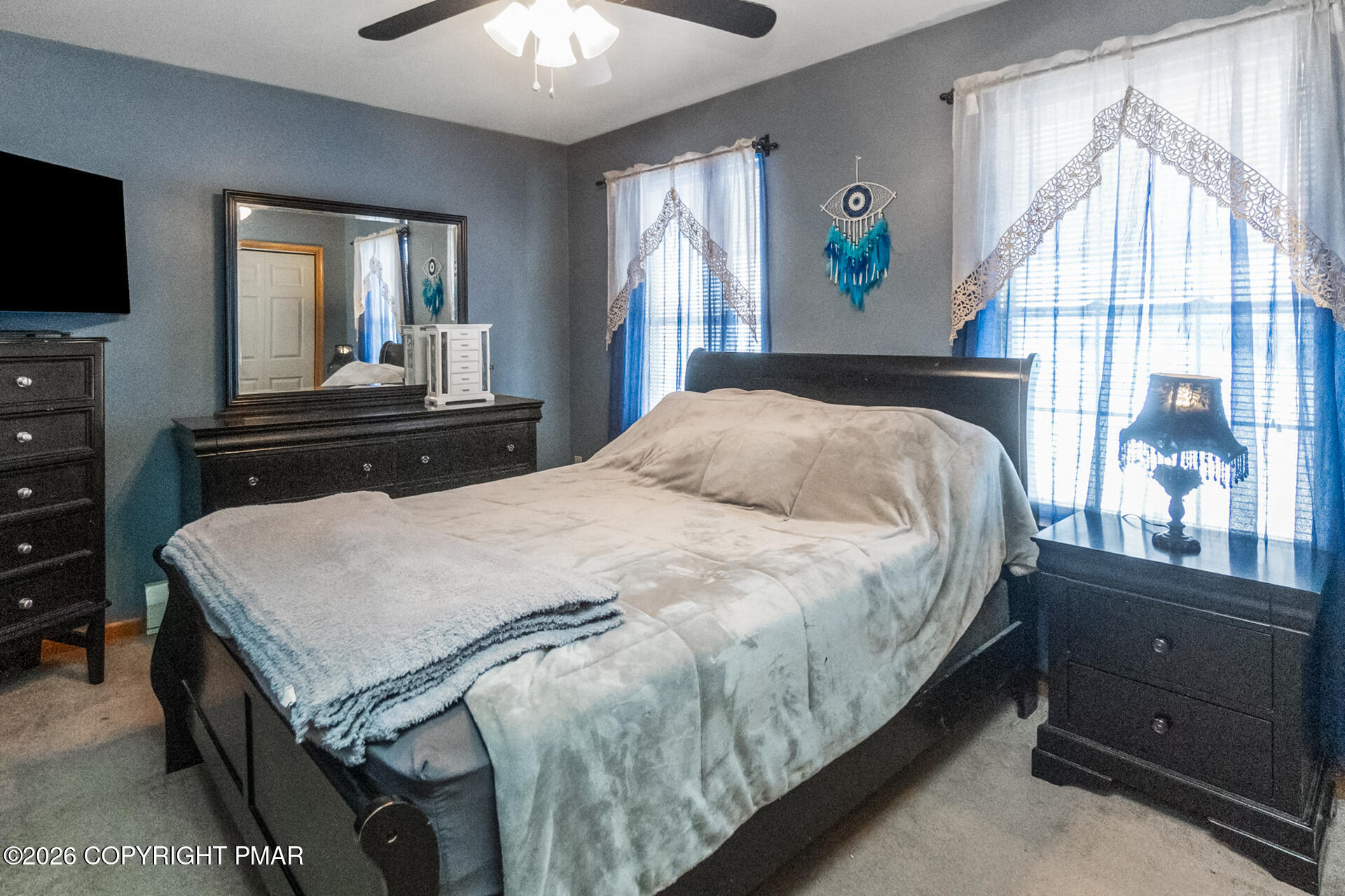 95 Benns Hill Road Bangor, PA 18013 - Photo 52 of 70 a bedroom with a bed and a flat tv screen on dresser