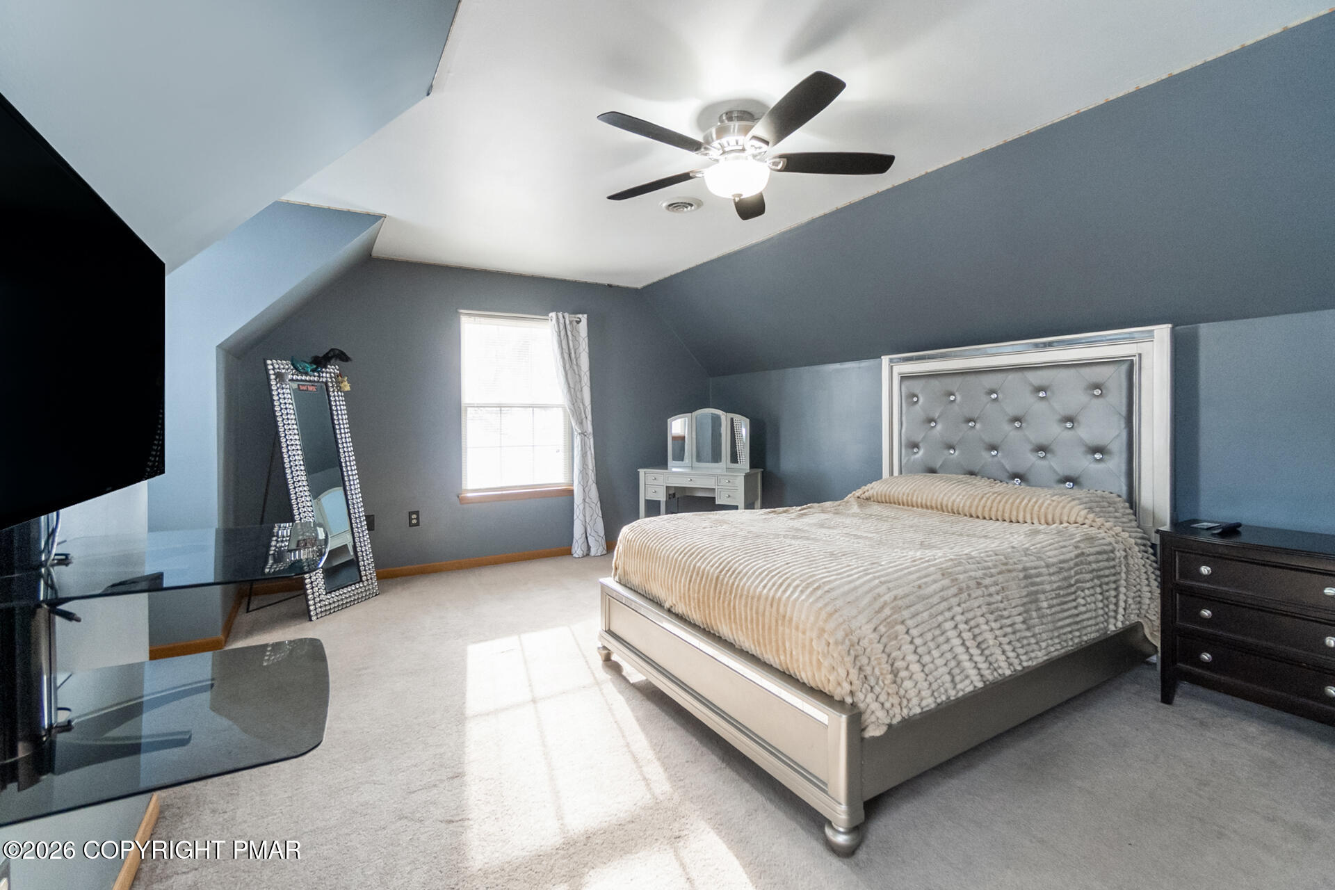 95 Benns Hill Road Bangor, PA 18013 - Photo 58 of 70 a bedroom with a bed flat screen tv and window