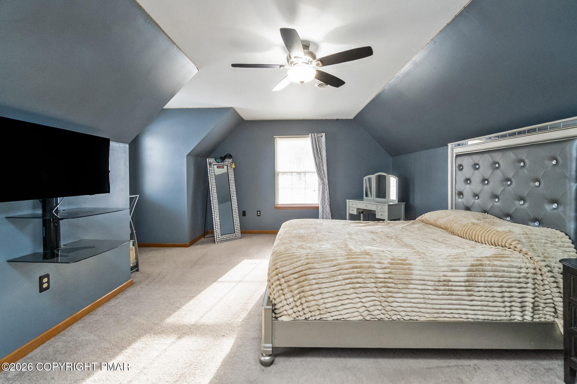 95 Benns Hill Road Bangor, PA 18013 - Photo 61 of 70 a bedroom with a bed and a flat tv screen on dresser