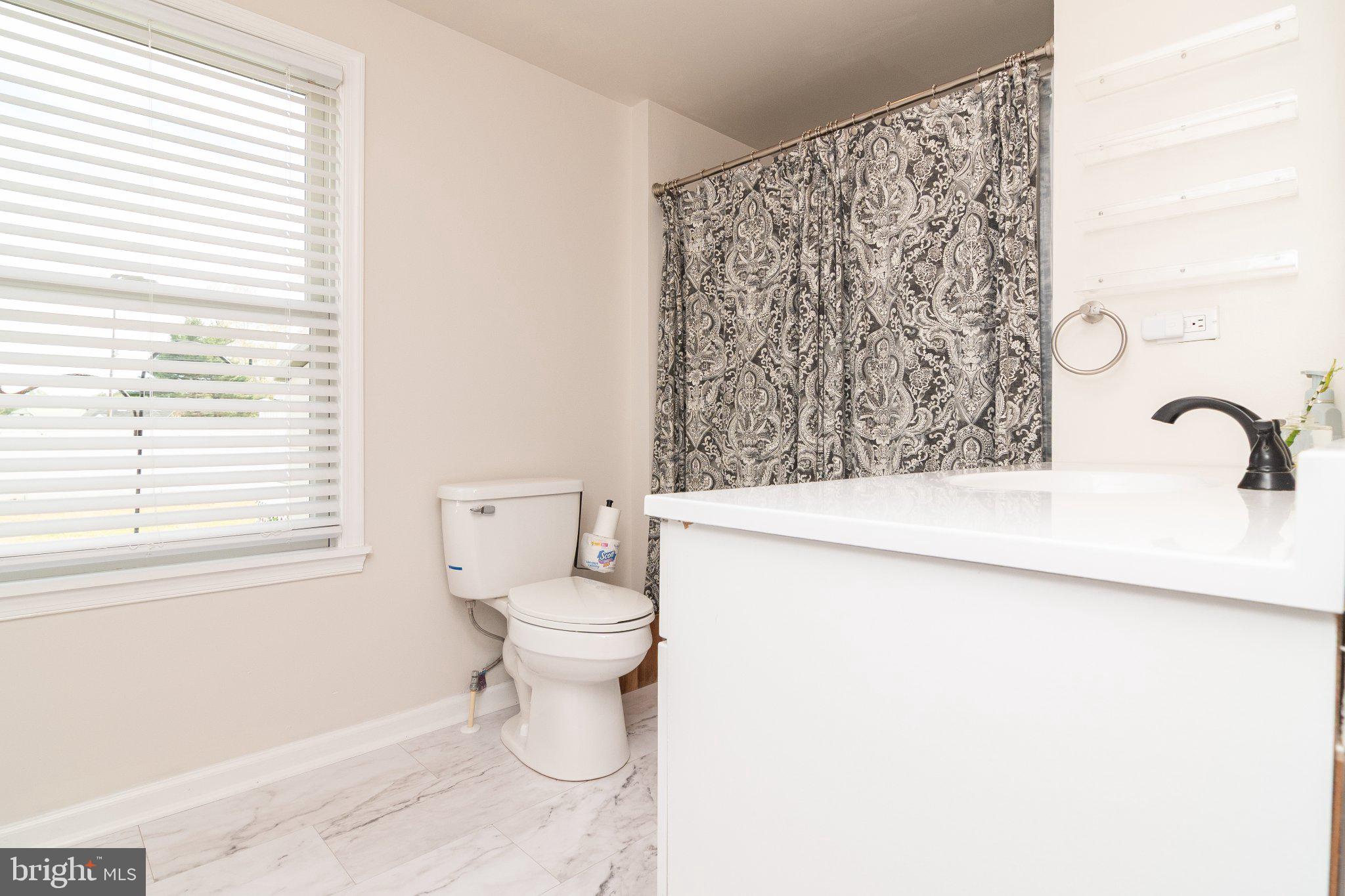 14788 Josephs Road Seaford, DE 19973 - Photo 11 of 25 Modern bathroom with elegant touches.