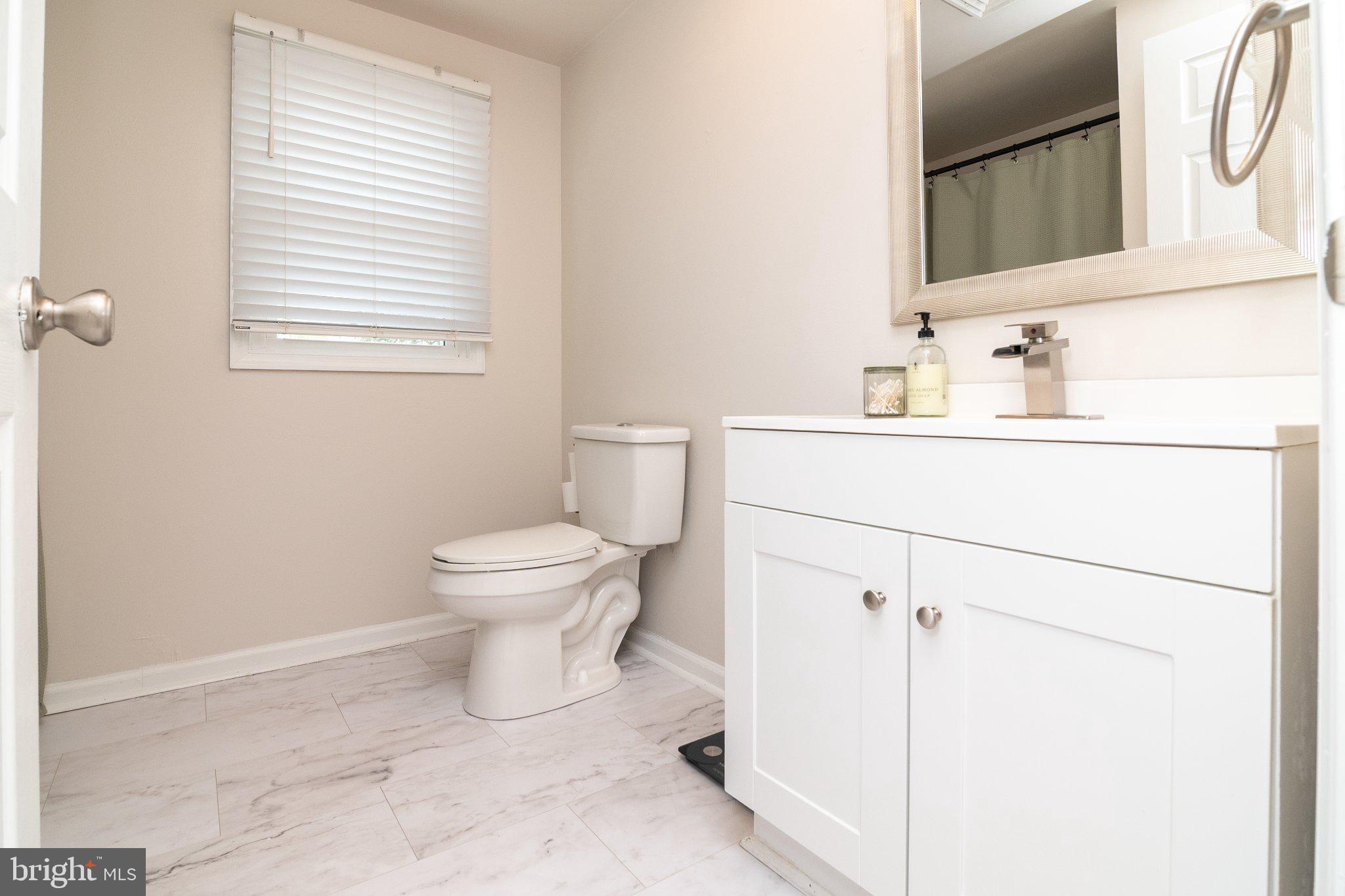 14788 Josephs Road Seaford, DE 19973 - Photo 14 of 25 Bright and airy modern bathroom retreat.