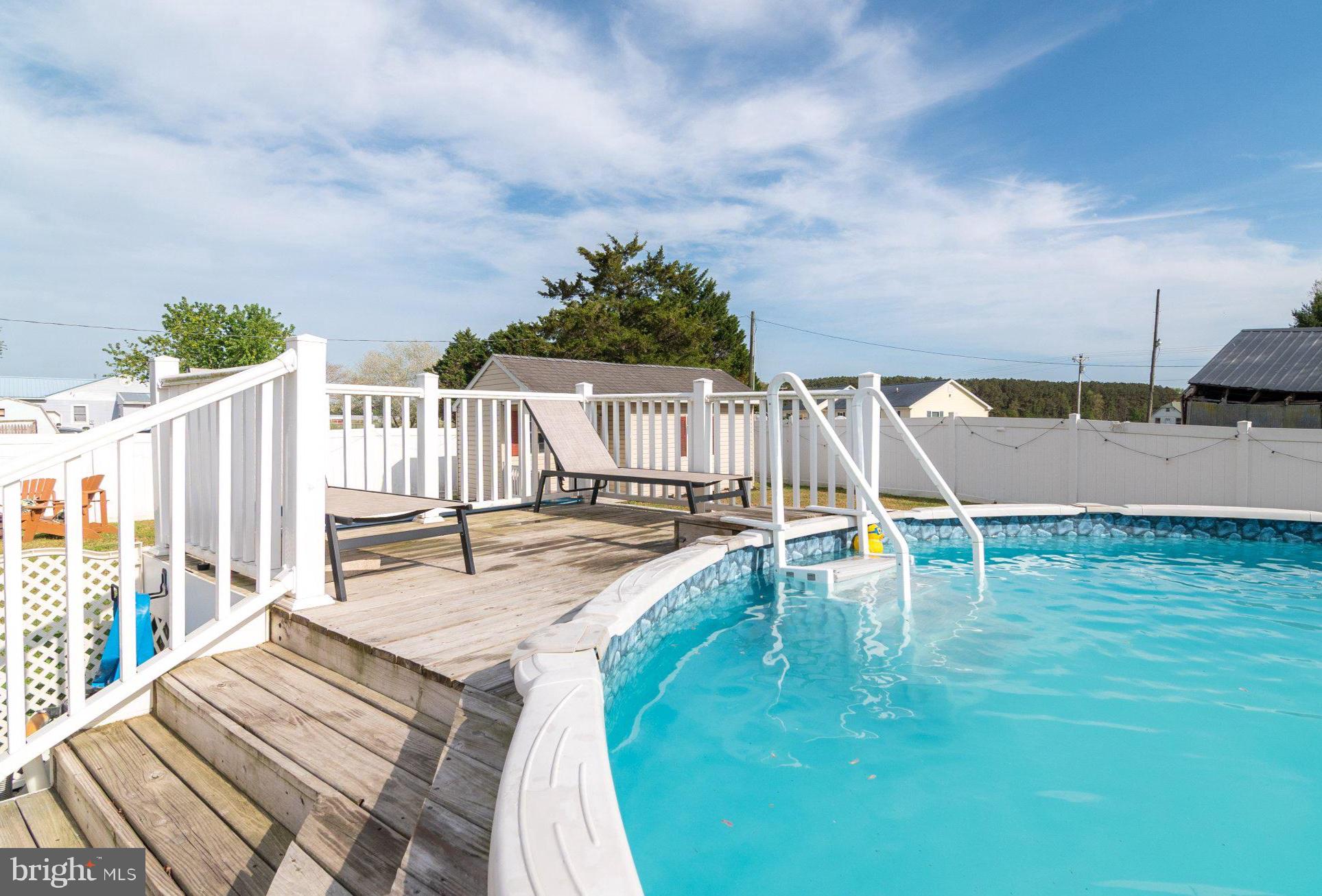 14788 Josephs Road Seaford, DE 19973 - Photo 23 of 25 Sunny retreat with inviting poolside.