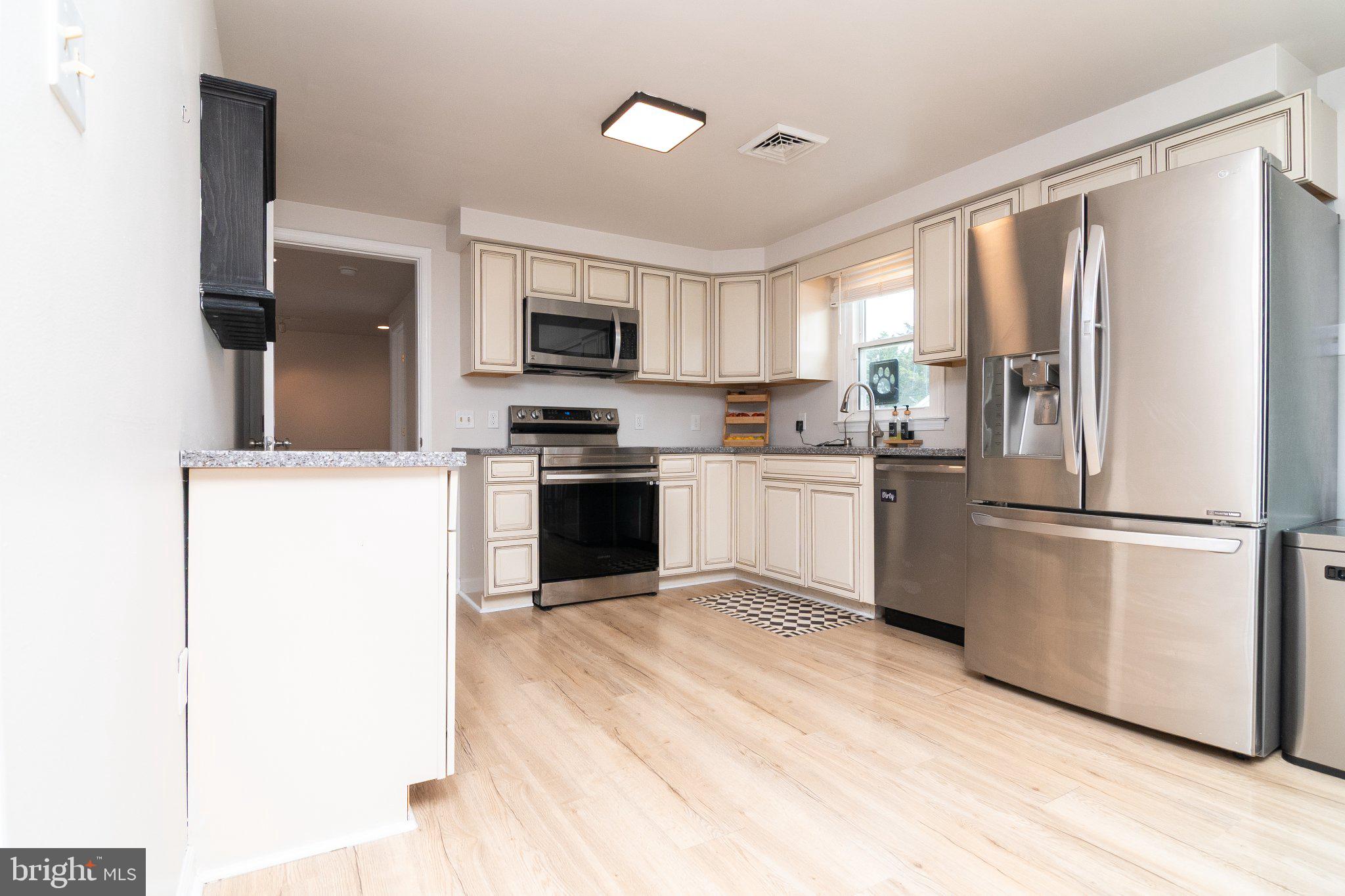 14788 Josephs Road Seaford, DE 19973 - Photo 4 of 25 Modern kitchen with sleek finishes.