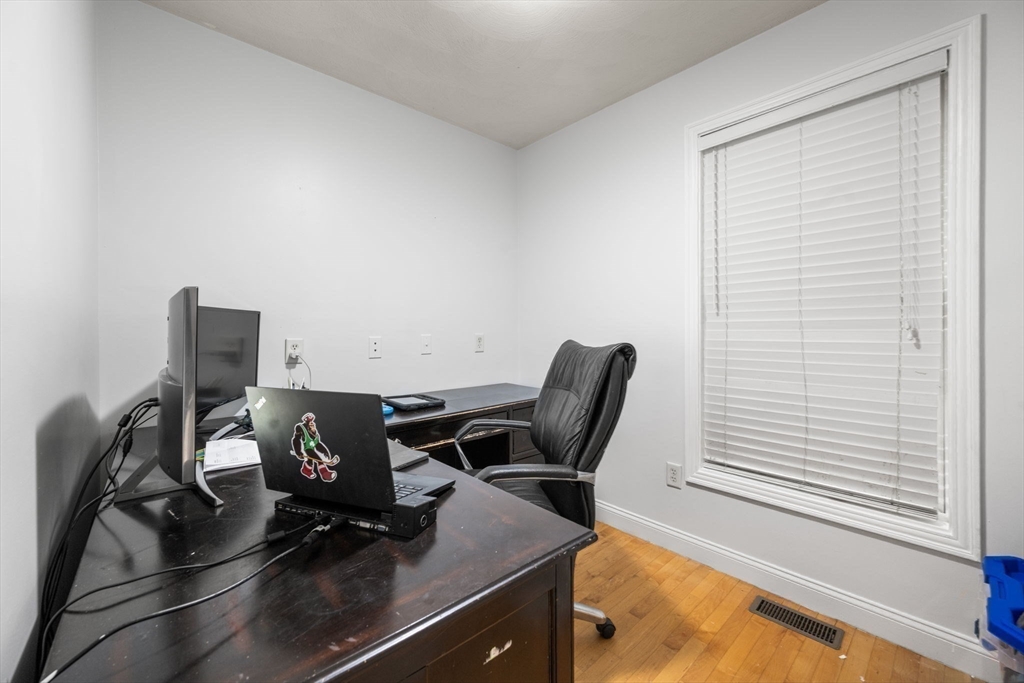 772 Main Street, Unit 2 Wakefield, MA 01880 - Photo 12 of 30 a view of a workspace with furniture and a window