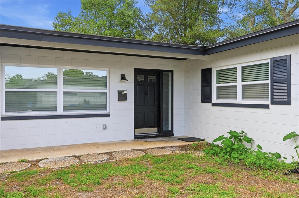 1946 Strathaven Road Winter Park, FL 32792 - Photo 29 of 37 a front view of a house with a yard
