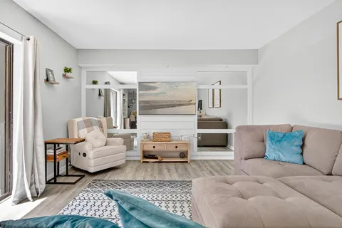 a living room with furniture and a couch