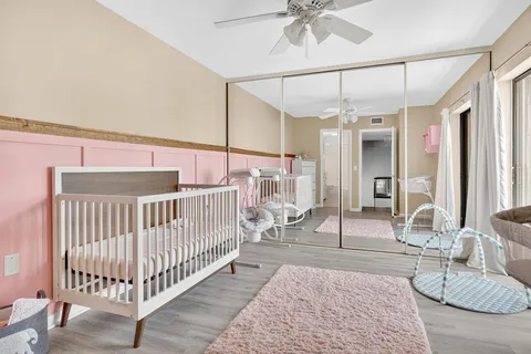 a bedroom with furniture and white walls