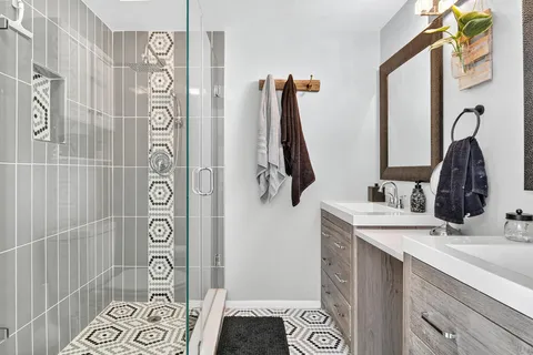 a bathroom with a sink and a mirror
