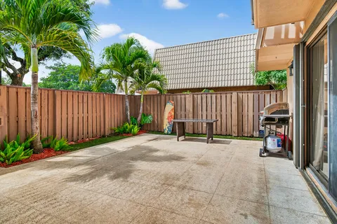 a view of outdoor space with seating area and garden