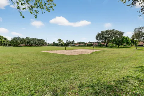 a view of a golf course with a lake