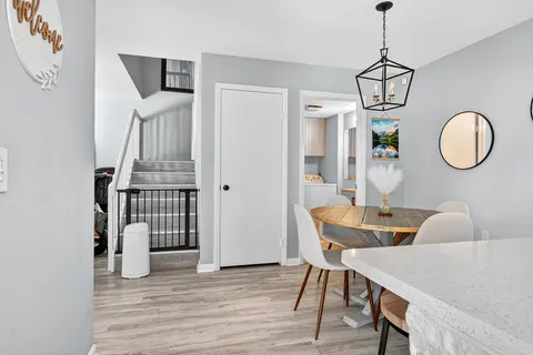 a view of dining room and wooden floor
