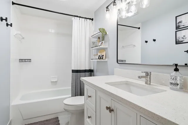 a view of a dinning table and chairs in the patio