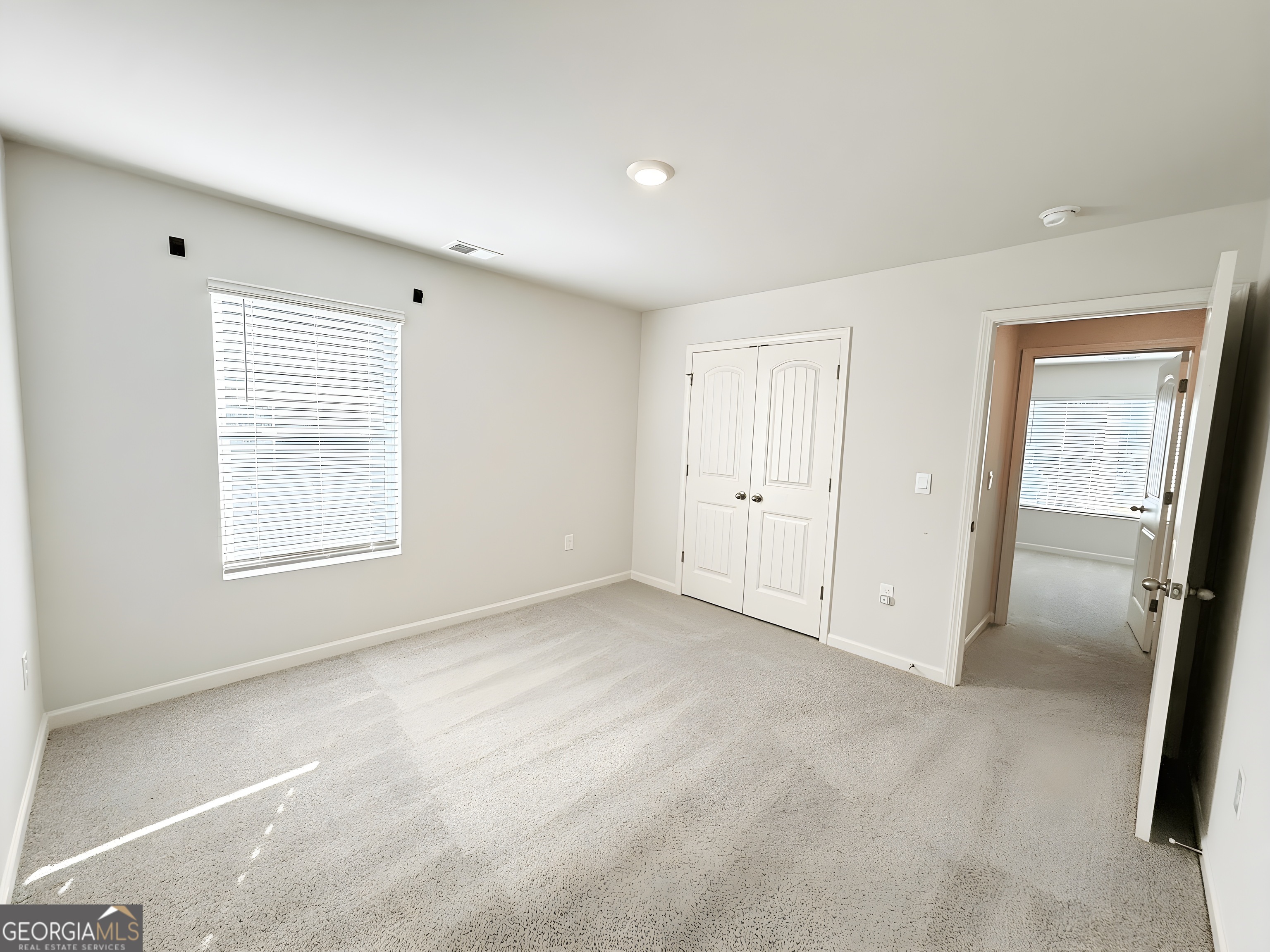 622 Brookfield Drive Braselton, GA 30517 - Photo 13 of 34 a view of an empty room with a window