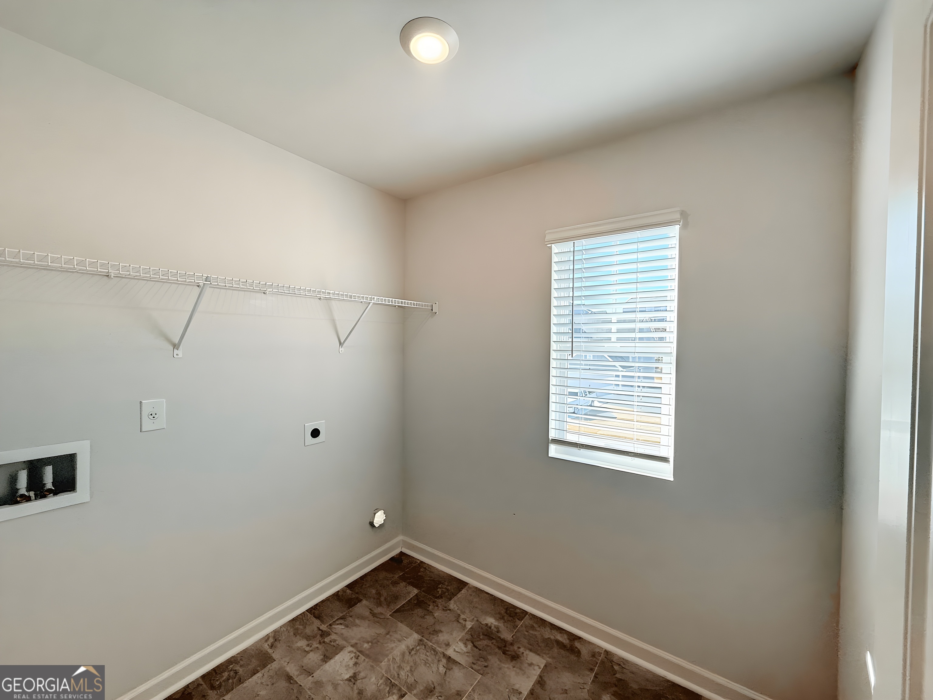 622 Brookfield Drive Braselton, GA 30517 - Photo 16 of 34 a view of small space with a window